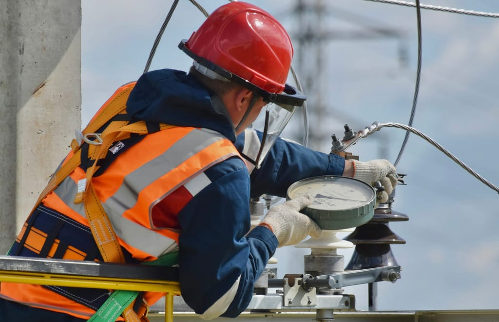 Electrical contractor assessing a commercial installation requirement