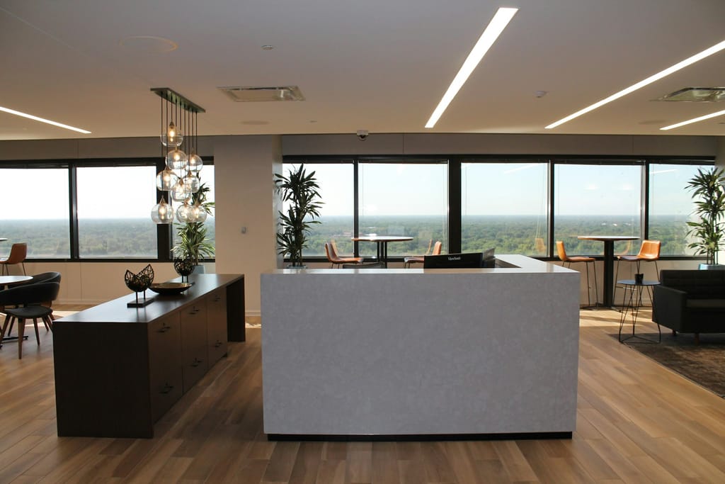 Office workplace with efficient commercial lighting installation